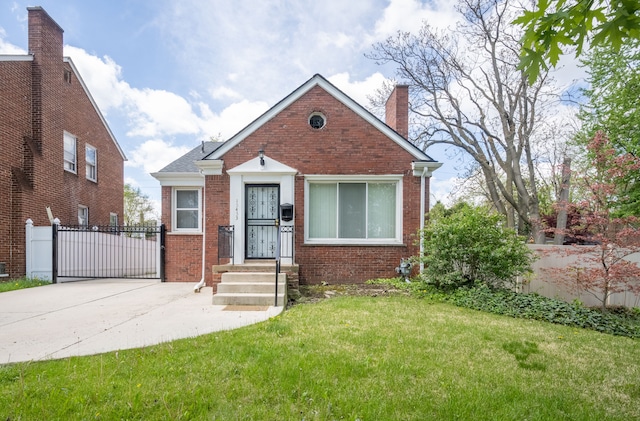 bungalow with brick siding and a chimney