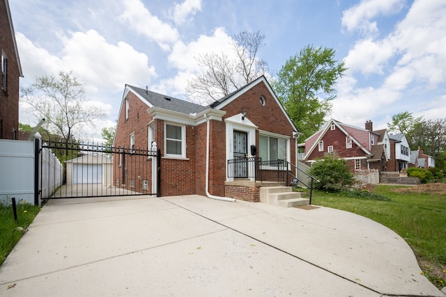bungalow-style house with brick siding, a gate, concrete driveway, and a residential view