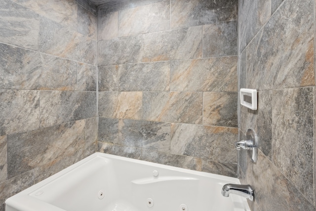 full bathroom featuring a combined bath / shower with jetted tub