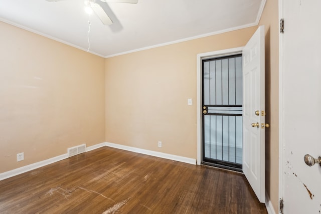 unfurnished room featuring wood finished floors, baseboards, ceiling fan, and crown molding