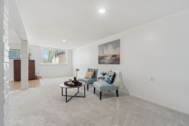 5780 Elvira, Pinckney, MI 48169 - carpeted living area featuring baseboards, recessed lighting, and decorative columns