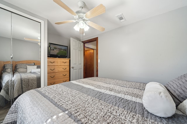 5780 Elvira, Pinckney, MI 48169 - bedroom with a closet and a ceiling fan