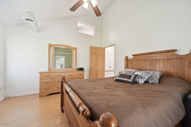 5780 Elvira, Pinckney, MI 48169 - bedroom featuring light wood-style flooring, high vaulted ceiling, baseboards, and a ceiling fan