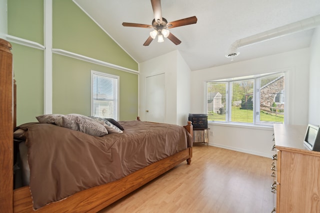 5780 Elvira, Pinckney, MI 48169 - bedroom featuring lofted ceiling, light wood finished floors, baseboards, and a ceiling fan