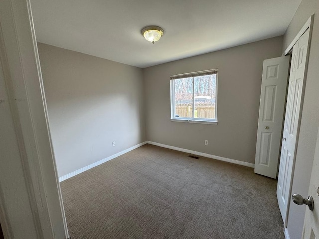 22031 Laurel St, Clinton Township, MI 48035 - unfurnished bedroom featuring carpet and baseboards