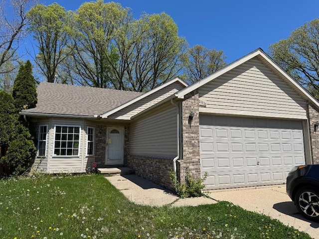 22031 Laurel St, Clinton Township, MI 48035 - single story home with a garage, a front lawn, brick siding, and driveway