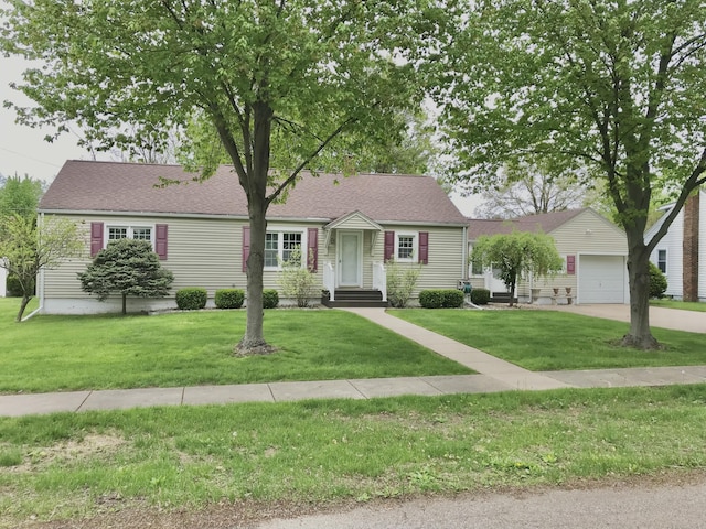399 E Vermont Ave, White Pigeon, MI 49099 - view of front facade with a front lawn, driveway, and a shingled roof