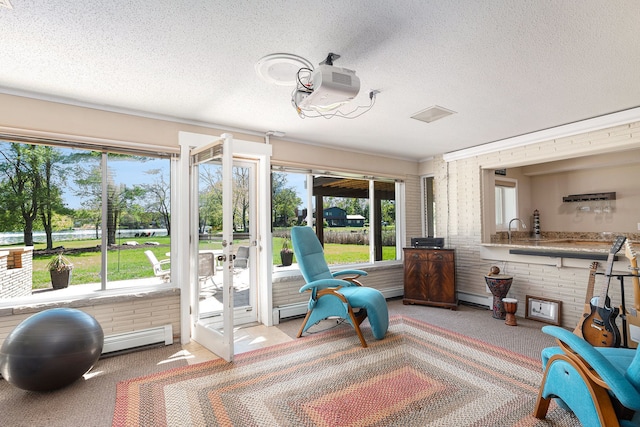 6305 N Shore Ct, West Bloomfield, MI 48324 - sunroom featuring french doors, plenty of natural light, and a baseboard heating unit