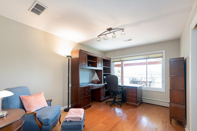 6305 N Shore Ct, West Bloomfield, MI 48324 - office featuring a baseboard radiator, light wood-type flooring, and baseboards