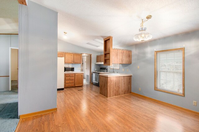 12346 Quail Ct, Shelby Twp, MI 48315 - kitchen featuring gas range, stainless steel microwave, open shelves, light countertops, and light wood finished floors