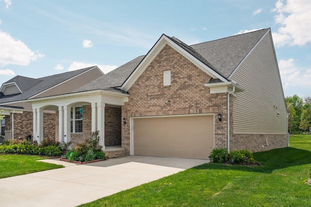 4814 Cranston Rd Unit 86, Canton, MI 48188 - craftsman-style house with brick siding, a front yard, concrete driveway, a garage, and a shingled roof