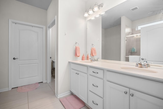 4814 Cranston Rd Unit 86, Canton, MI 48188 - bathroom with a stall shower, double vanity, tile patterned flooring, and baseboards