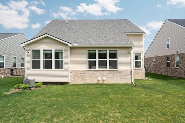 4814 Cranston Rd Unit 86, Canton, MI 48188 - rear view of property with a yard, brick siding, cooling unit, and a shingled roof