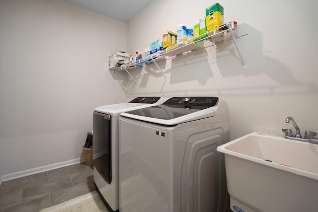 4814 Cranston Rd Unit 86, Canton, MI 48188 - washroom featuring washing machine and clothes dryer and baseboards