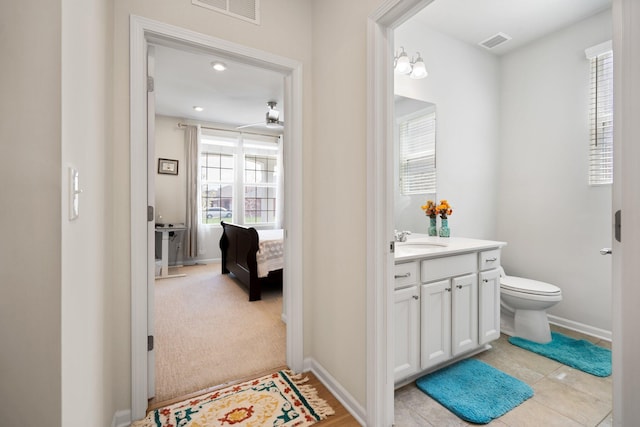 4814 Cranston Rd Unit 86, Canton, MI 48188 - bathroom with vanity, baseboards, and toilet