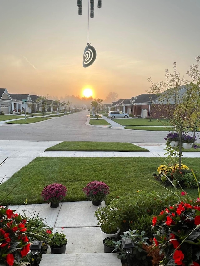 4814 Cranston Rd Unit 86, Canton, MI 48188 - yard at dusk featuring a residential view and a lawn