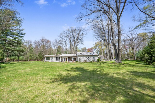 8607 Cochise Ct, Howard City, MI 49329 - view of green lawn