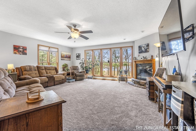 1087 Shore Walk Ln, Whitehall, MI 49461 - carpeted living room featuring ceiling fan, plenty of natural light, and a textured ceiling