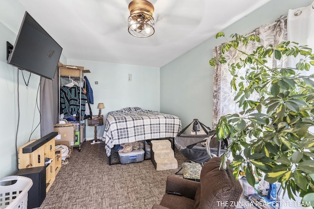 1087 Shore Walk Ln, Whitehall, MI 49461 - carpeted bedroom featuring a ceiling fan