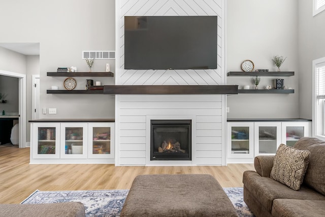 5414 Bradley Ct, Kalamazoo, MI 49009 - living room with wood finished floors and a large fireplace