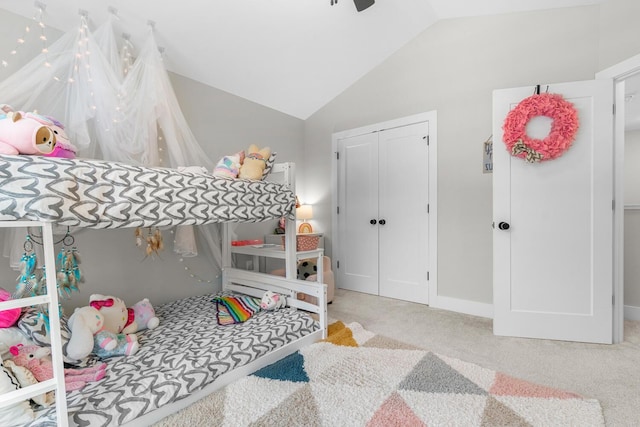 5414 Bradley Ct, Kalamazoo, MI 49009 - bedroom with lofted ceiling, carpet flooring, a closet, baseboards, and a ceiling fan