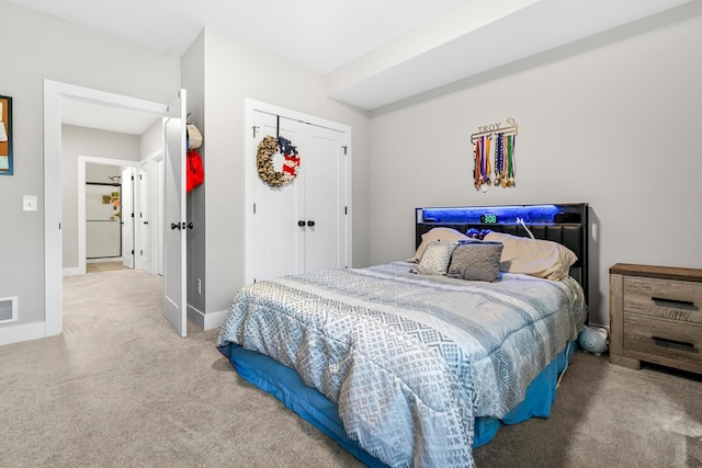 5414 Bradley Ct, Kalamazoo, MI 49009 - bedroom featuring carpet flooring, a closet, and baseboards