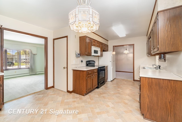2936 Reppuhn Dr, Saginaw, MI 48603 - kitchen featuring white appliances, a chandelier, a sink, a baseboard radiator, and baseboards