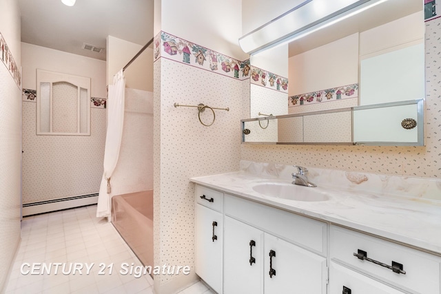 2936 Reppuhn Dr, Saginaw, MI 48603 - bathroom featuring a baseboard heating unit, vanity, and shower / bath combo