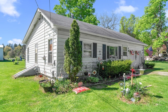117 Hanover Ct, Hanover, MI 49241 - view of property exterior with a lawn