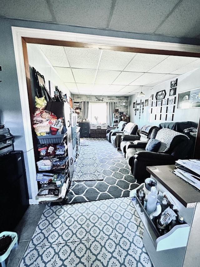 117 Hanover Ct, Hanover, MI 49241 - workout area with a drop ceiling and tile patterned floors
