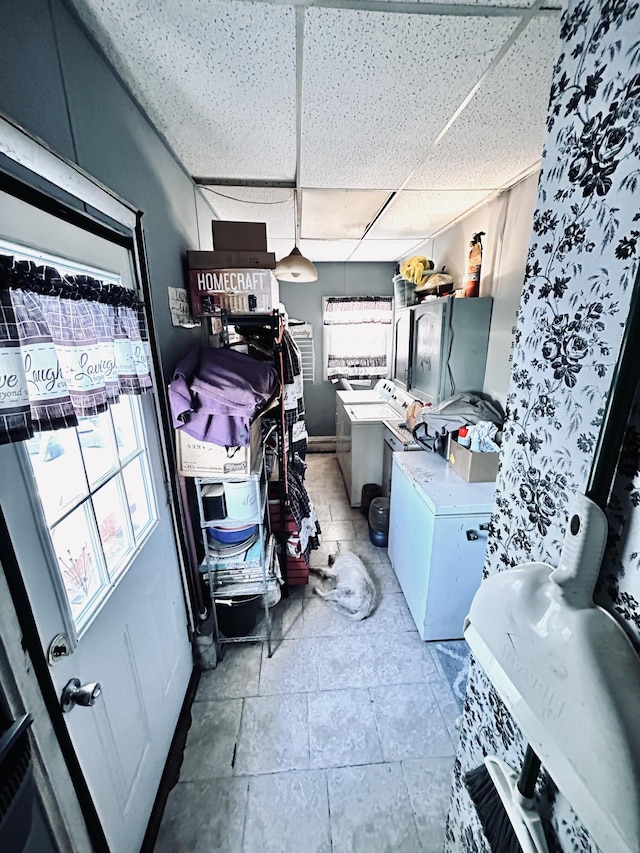 117 Hanover Ct, Hanover, MI 49241 - laundry area featuring baseboards and washer and clothes dryer