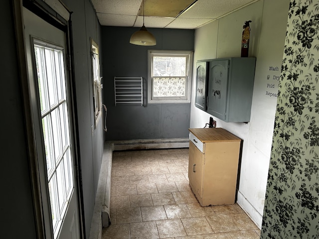 117 Hanover Ct, Hanover, MI 49241 - laundry area with a baseboard radiator