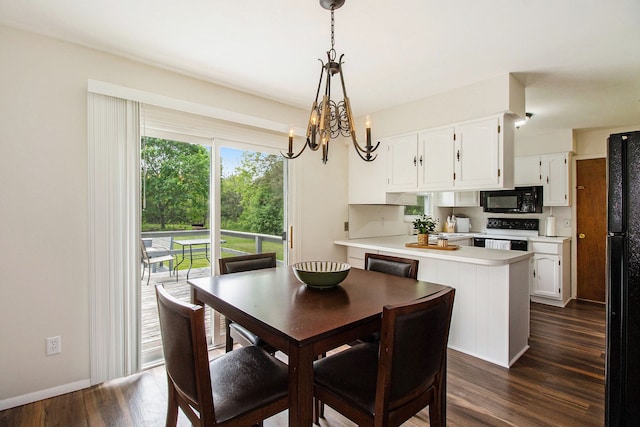 7055 N Center Rd, Mount Morris, MI 48458 - dining room with dark wood-style floors and a chandelier