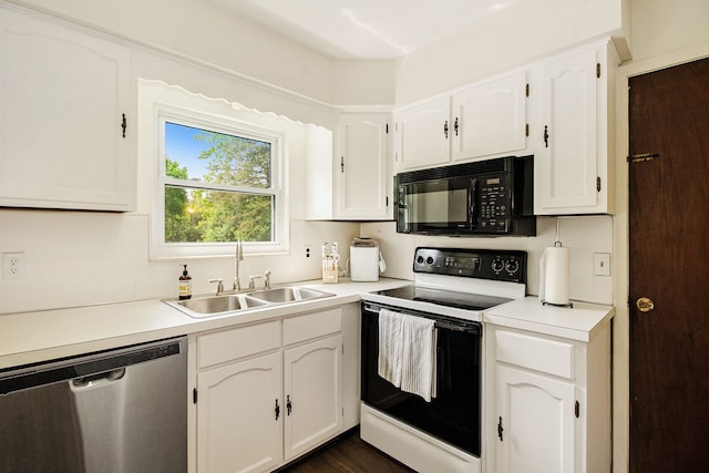 7055 N Center Rd, Mount Morris, MI 48458 - kitchen with black microwave, range with electric stovetop, stainless steel dishwasher, a sink, and white cabinetry