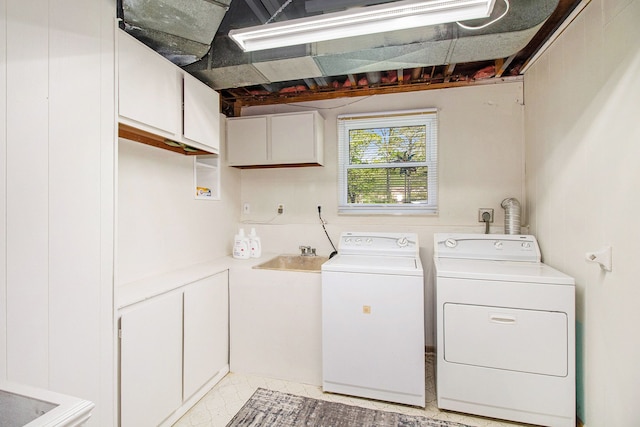 7055 N Center Rd, Mount Morris, MI 48458 - clothes washing area with cabinet space and independent washer and dryer