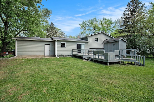 7055 N Center Rd, Mount Morris, MI 48458 - back of property with a deck, a lawn, a shed, an outbuilding, and a chimney