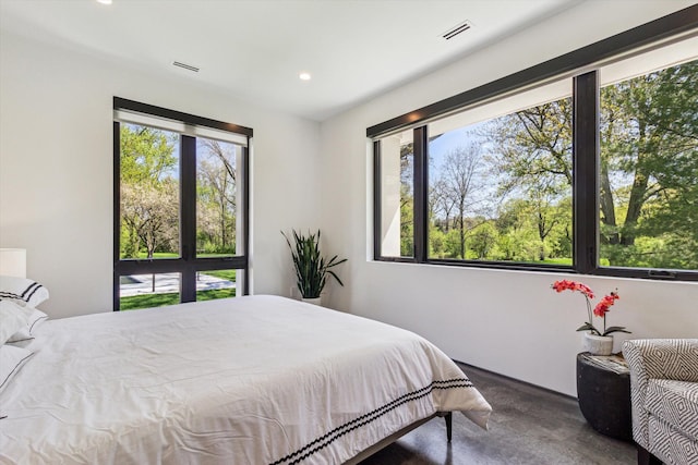 bedroom featuring recessed lighting and carpet flooring
