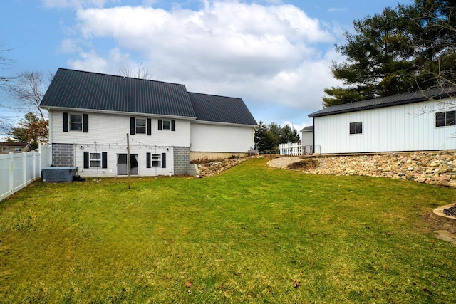 839 Rolling Meadows Dr, Quincy, MI 49082 - back of property with metal roof and central AC
