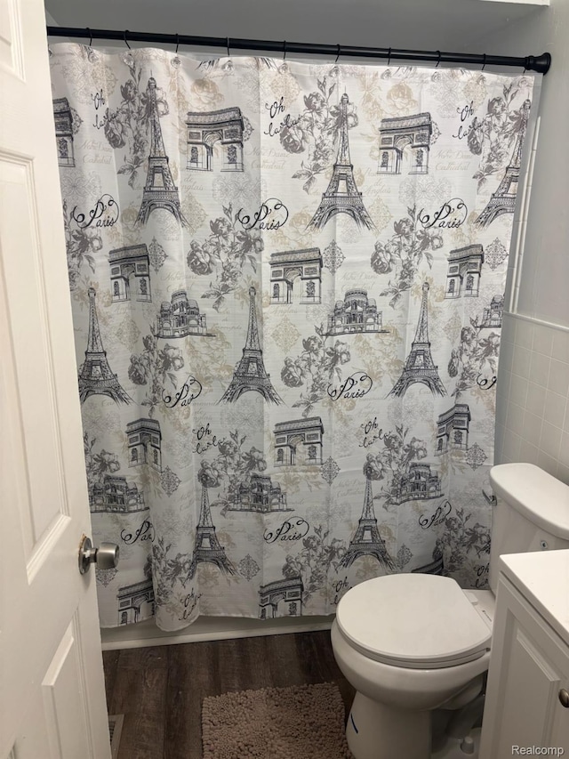 26176 Andover St, Inkster, MI 48141 - full bath with wood finished floors, vanity, and tile walls