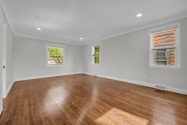 16585 Sunderland Rd, Detroit, MI 48219 - unfurnished room with wood finished floors, baseboards, and recessed lighting