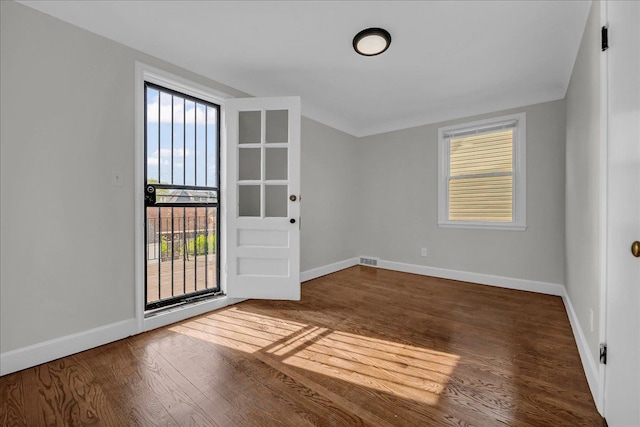 16585 Sunderland Rd, Detroit, MI 48219 - unfurnished room with wood finished floors and baseboards