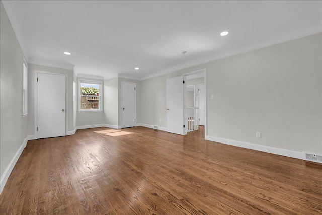 16585 Sunderland Rd, Detroit, MI 48219 - empty room with wood finished floors, recessed lighting, and baseboards