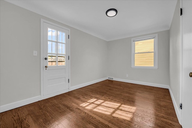 16585 Sunderland Rd, Detroit, MI 48219 - empty room with wood finished floors and baseboards