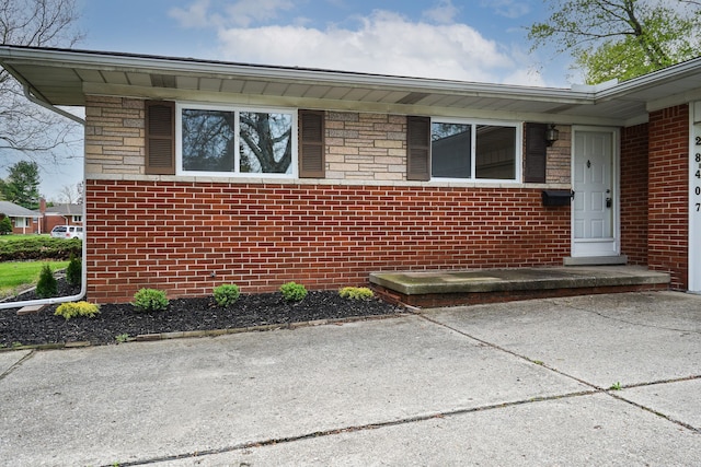 28407 Milton Ave, Warren, MI 48092 - doorway to property with brick siding