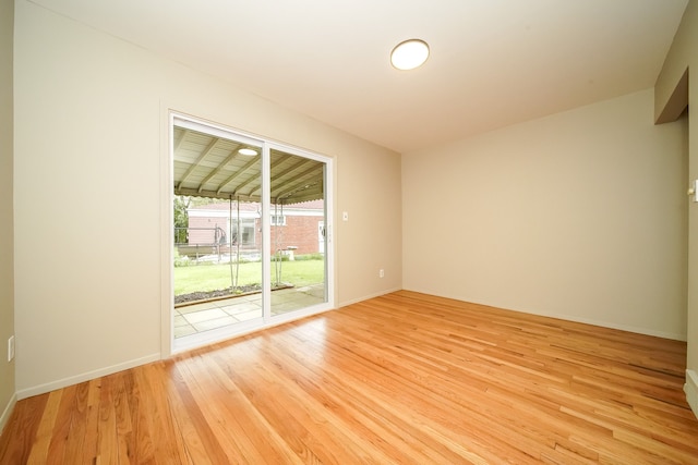 28407 Milton Ave, Warren, MI 48092 - empty room featuring light wood finished floors and baseboards