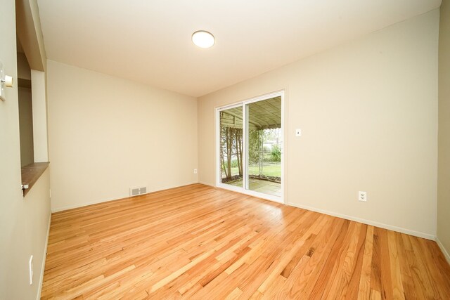 28407 Milton Ave, Warren, MI 48092 - empty room with wood finished floors and baseboards