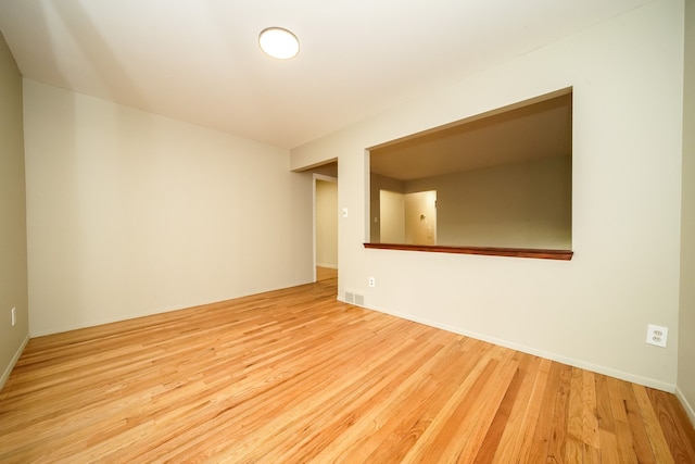 28407 Milton Ave, Warren, MI 48092 - empty room featuring wood finished floors and baseboards