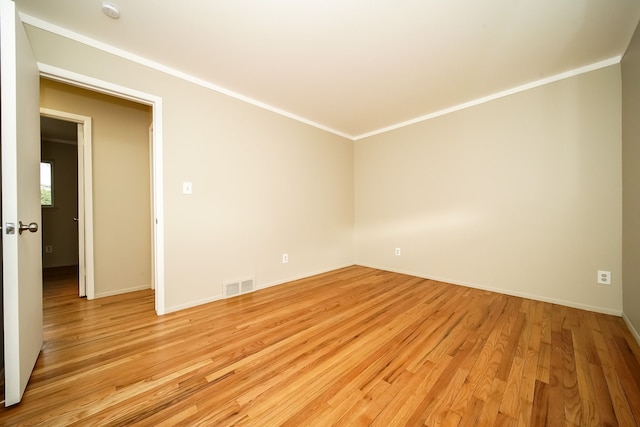 28407 Milton Ave, Warren, MI 48092 - empty room with light wood-type flooring, baseboards, ornamental molding, and a smoke detector