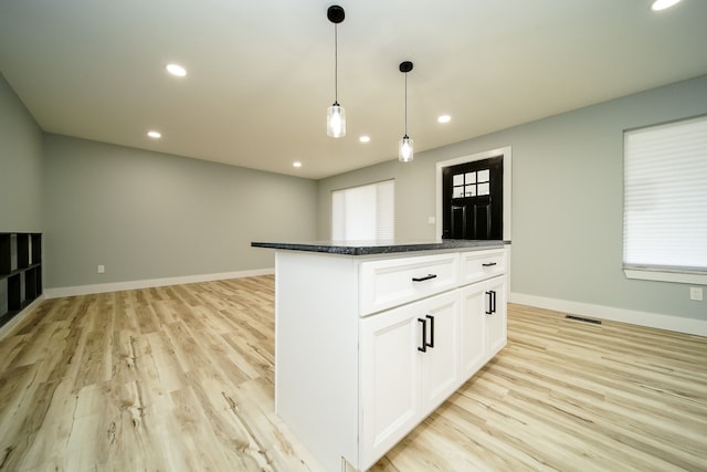 34067 Chatsworth Dr, Sterling Heights, MI 48312 - kitchen featuring light wood-style floors, a center island, recessed lighting, white cabinets, and pendant lighting