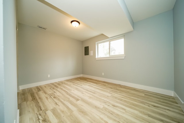 34067 Chatsworth Dr, Sterling Heights, MI 48312 - spare room featuring wood finished floors, electric panel, and baseboards
